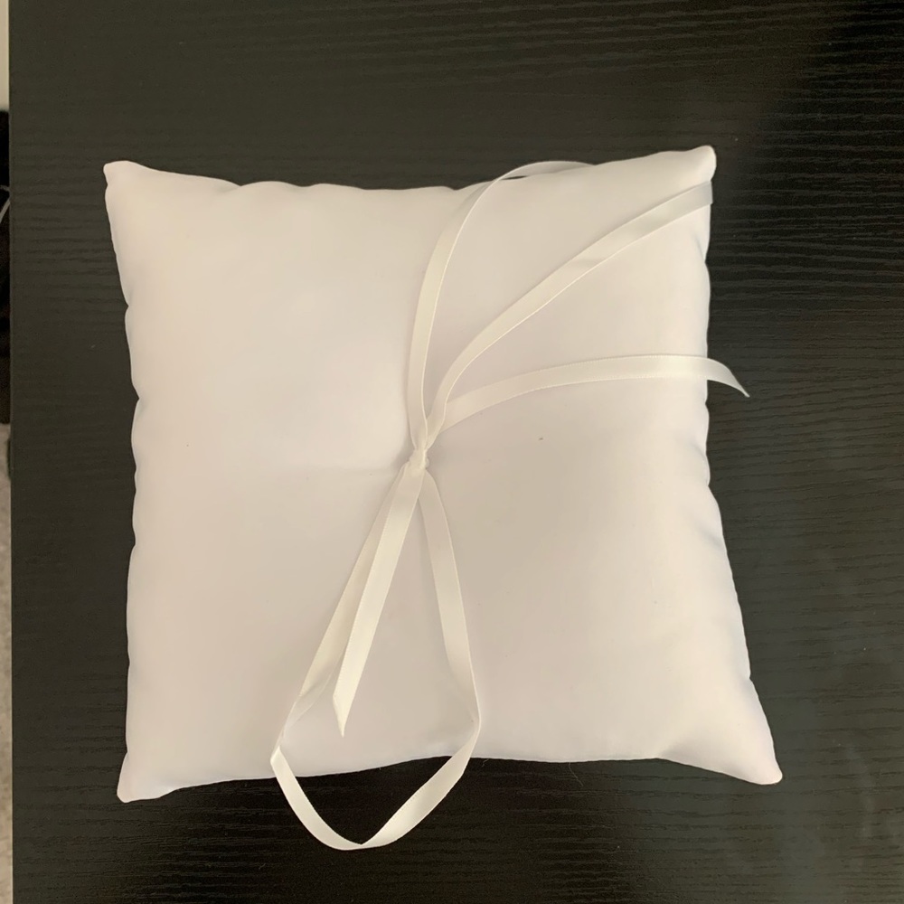 White ring bearer pillow for wedding